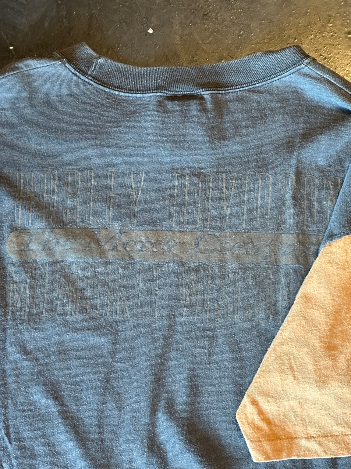 Rear view showing faded back graphic