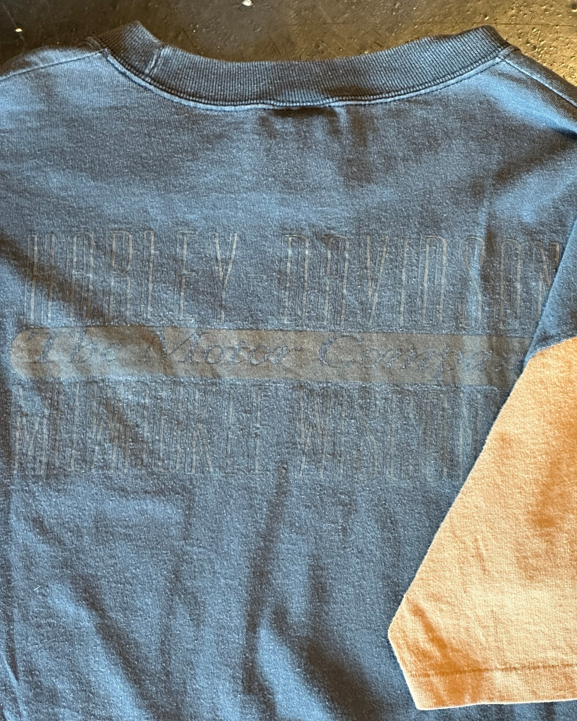 Rear view showing faded back graphic