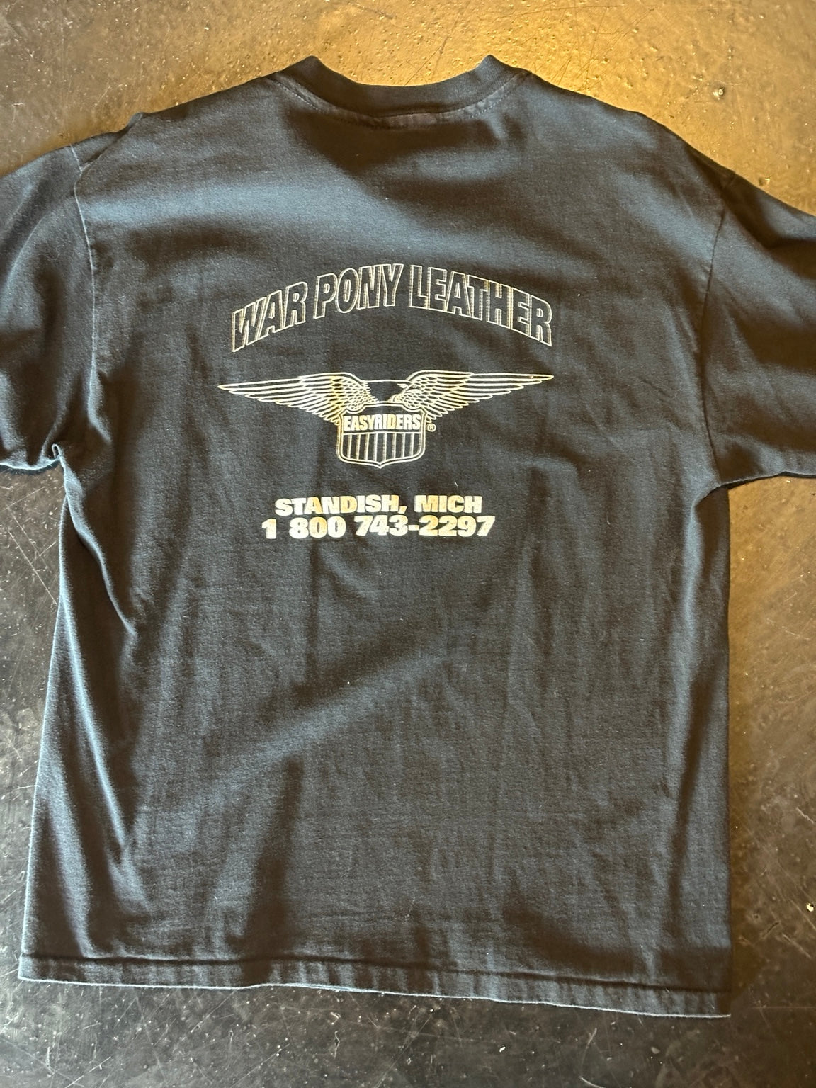 Rear view of black T-shirt