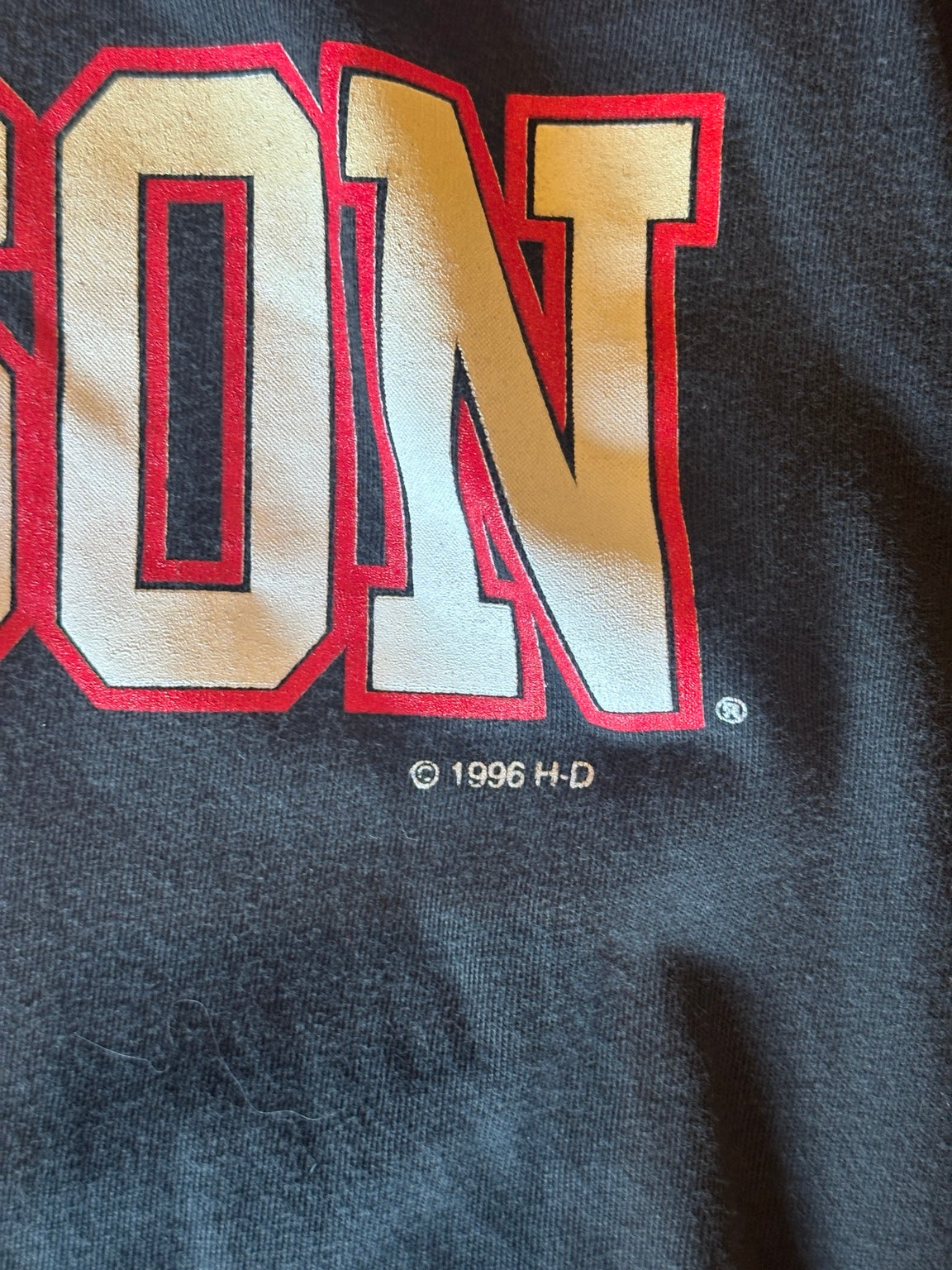 Close-up of 1996 Harley-Davidson graphic copyright detail